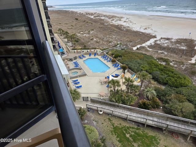 bird's eye view with a view of the beach and a water view