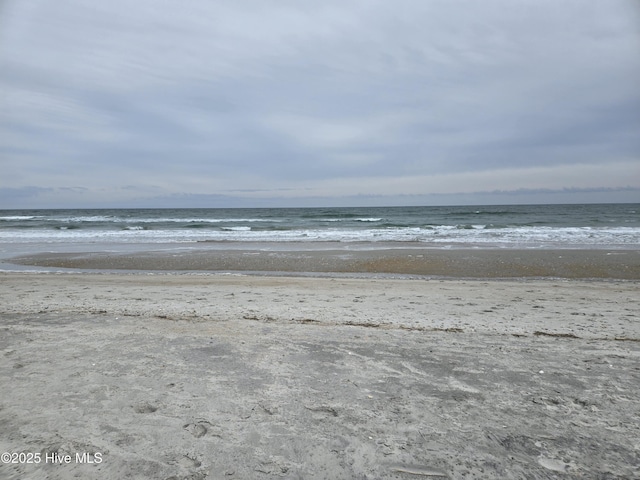 view of water feature featuring a beach view