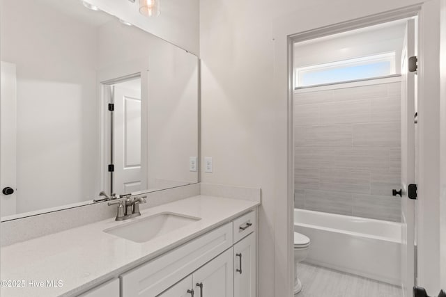 full bath featuring toilet and vanity