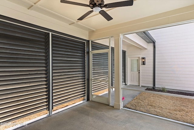 exterior space featuring a ceiling fan