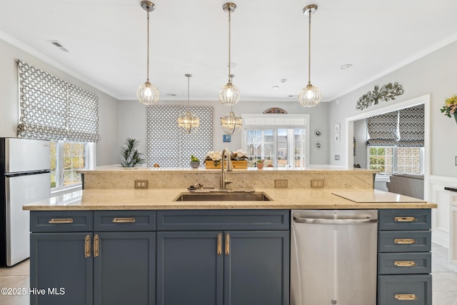 kitchen with crown molding, dishwasher, light stone counters, freestanding refrigerator, and a sink