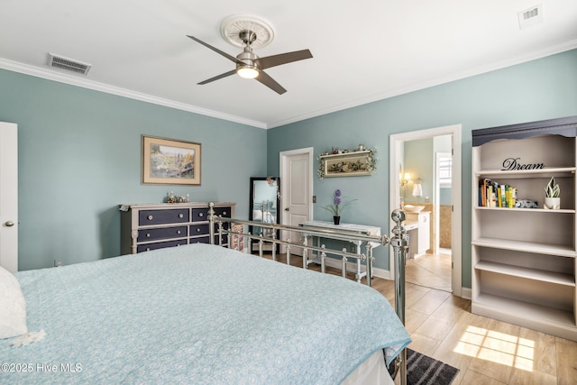 bedroom featuring visible vents, baseboards, and crown molding