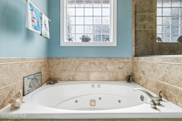 full bath featuring a whirlpool tub