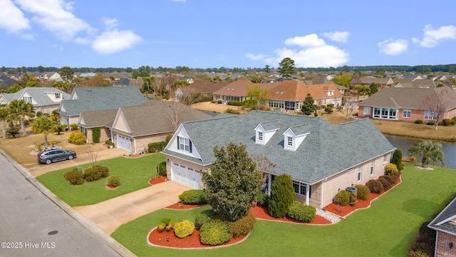 drone / aerial view with a residential view