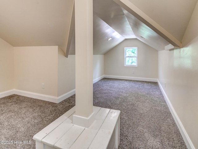 bonus room featuring carpet flooring, baseboards, and lofted ceiling