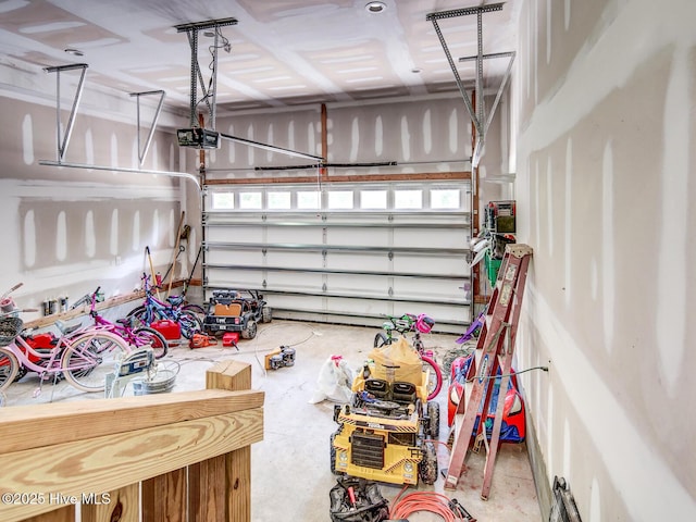 garage featuring a garage door opener