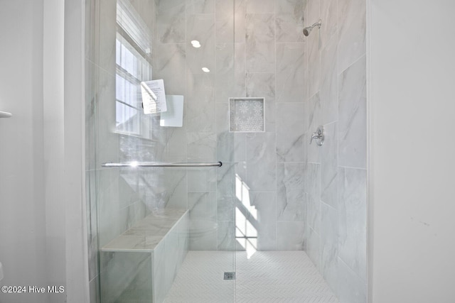 full bathroom with a shower stall