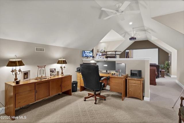 home office featuring visible vents, baseboards, lofted ceiling, light carpet, and a ceiling fan