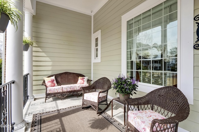 balcony featuring a porch