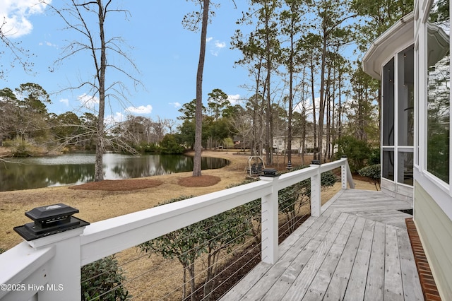 deck featuring a water view