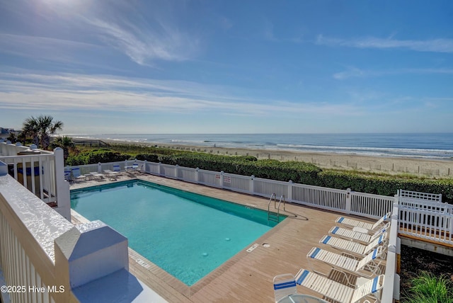 1808 Baywater Ct SE, Bolivia, NC 28422 - community pool with a view of the beach, fence, a water view, and a patio