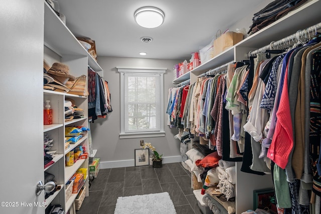 walk in closet featuring visible vents