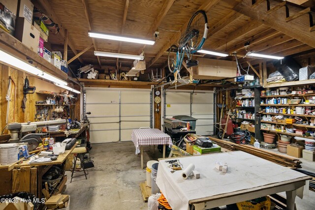 garage with a workshop area