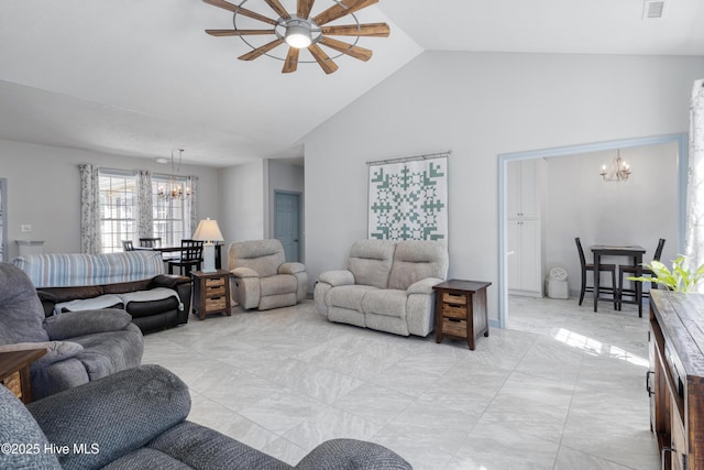 living area with lofted ceiling, ceiling fan with notable chandelier, and visible vents