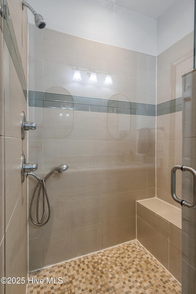 bathroom featuring a stall shower