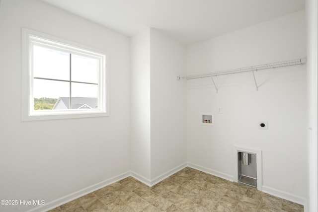 laundry room with electric dryer hookup, baseboards, hookup for a washing machine, and laundry area