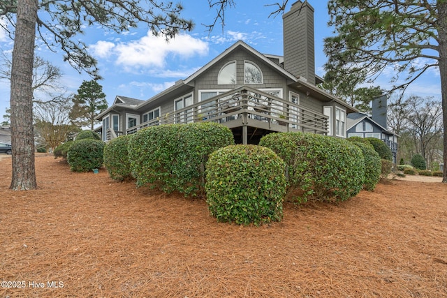 rear view of house with a chimney