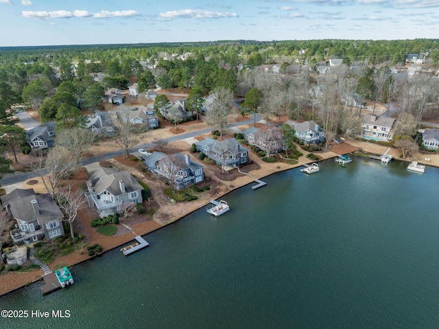 aerial view with a water view and a residential view