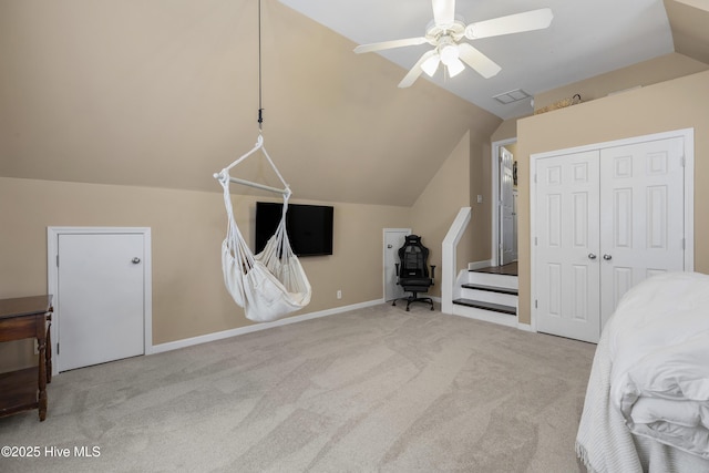 bedroom featuring carpet, visible vents, ceiling fan, vaulted ceiling, and a closet