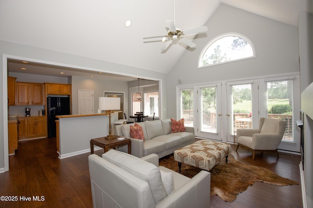 living area featuring recessed lighting, high vaulted ceiling, dark wood-style floors, and a ceiling fan