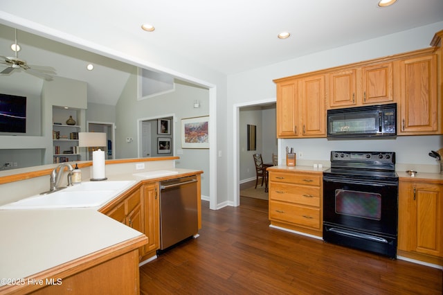 kitchen featuring ceiling fan, light countertops, lofted ceiling, black appliances, and a sink