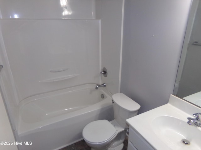 full bathroom featuring tub / shower combination, toilet, and vanity