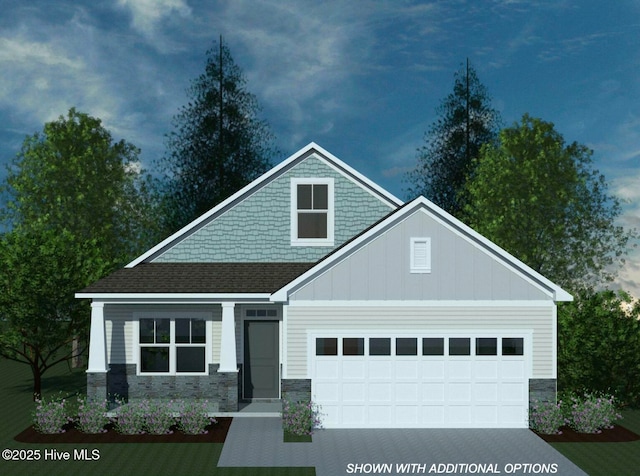 craftsman house with a garage, stone siding, driveway, and a shingled roof