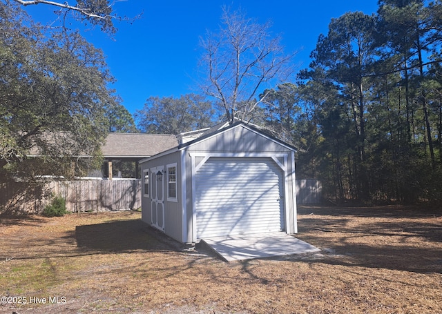 garage featuring fence