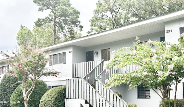 exterior space with stucco siding