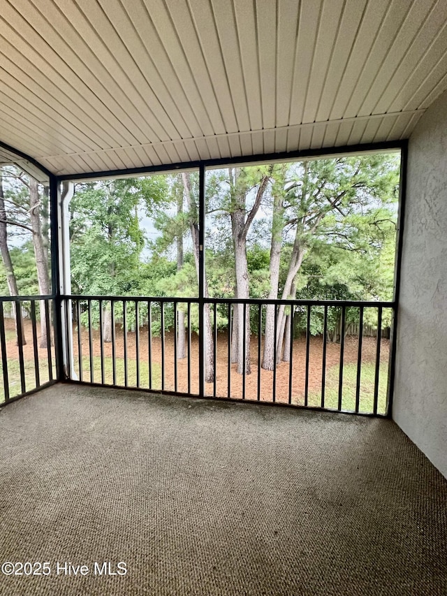 unfurnished sunroom featuring a healthy amount of sunlight