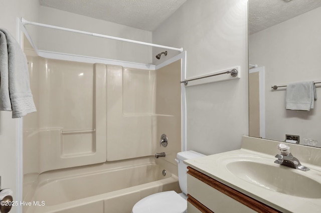 bathroom featuring vanity, shower / tub combination, toilet, and a textured ceiling