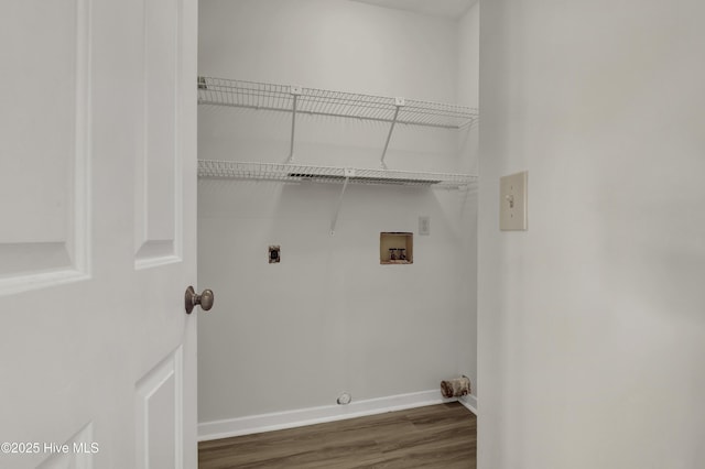 washroom featuring baseboards, washer hookup, laundry area, wood finished floors, and hookup for an electric dryer