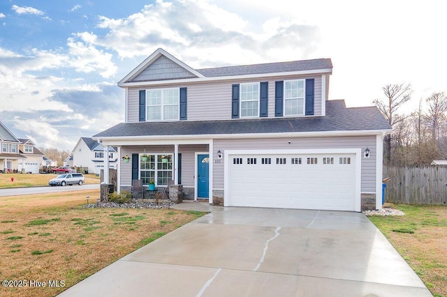 craftsman house featuring fence, a porch, concrete driveway, a garage, and stone siding