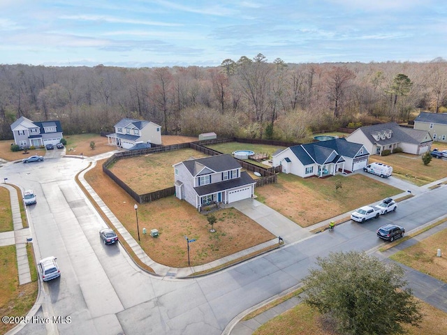 aerial view featuring a view of trees