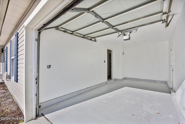 garage featuring a garage door opener