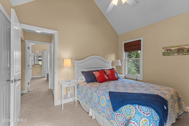 bedroom featuring carpet flooring, a ceiling fan, baseboards, and high vaulted ceiling