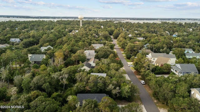 bird's eye view featuring a forest view