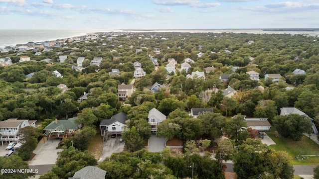 birds eye view of property featuring a water view and a residential view