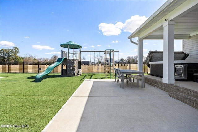 exterior space featuring a patio area, a yard, and fence