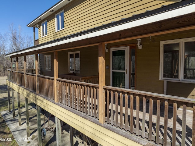 wooden terrace featuring a porch