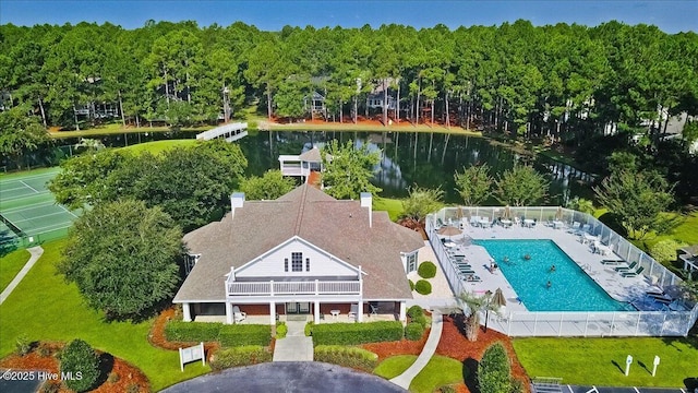 birds eye view of property featuring a water view