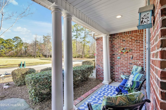 view of patio featuring a porch