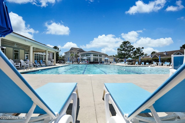 community pool with a patio