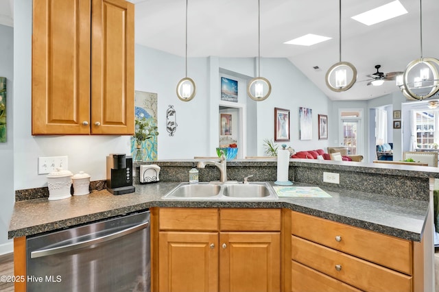 kitchen featuring stainless steel dishwasher, a peninsula, brown cabinetry, and a sink