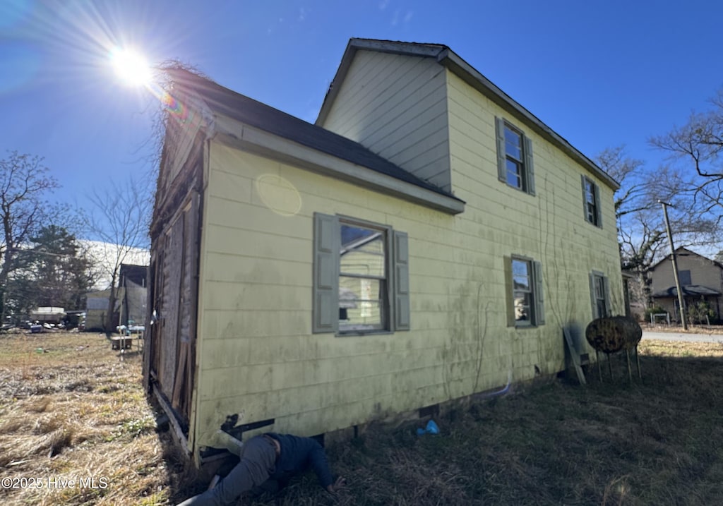 view of property exterior featuring crawl space