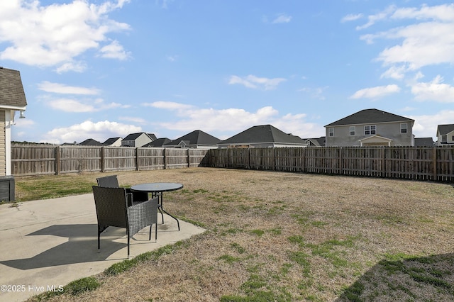 view of yard featuring a fenced backyard and a patio area