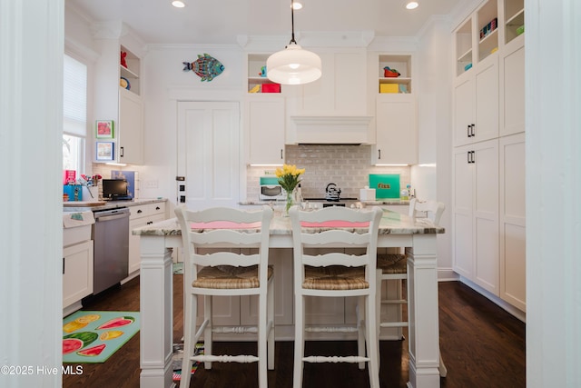 kitchen featuring dishwasher, open shelves, an island with sink, and white cabinetry