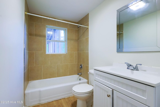 2209 Barnett Ave, Wilmington, NC 28403 - full bath with vanity, wood finished floors, and bathtub / shower combination