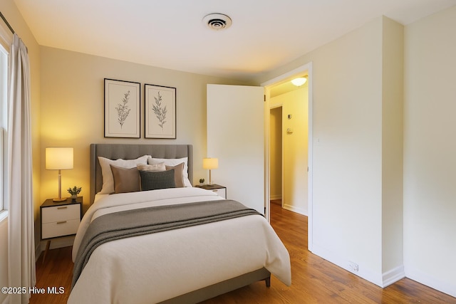 2209 Barnett Ave, Wilmington, NC 28403 - bedroom featuring wood finished floors