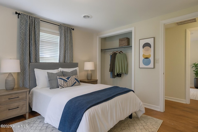2209 Barnett Ave, Wilmington, NC 28403 - bedroom with wood finished floors and a closet